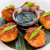 Chick And Shrimp Fritter · Ground chicken and shrimp, water chestnuts and shiitake mushrooms served with tangy soy sauce.