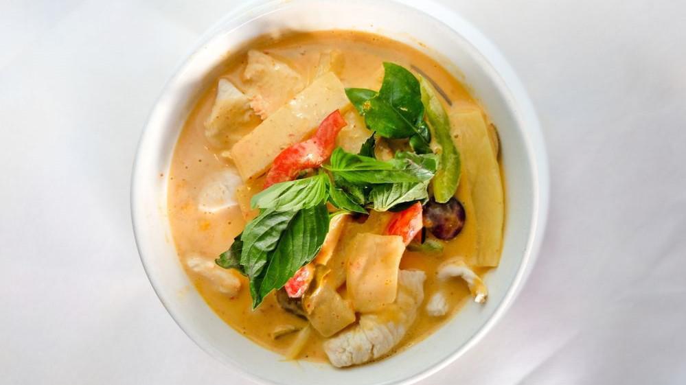 Red Curry · Spicy. Red creamy Thai chili paste with bamboo shoot, eggplant, string beans and basil leaves with coconut milk. Served with jasmine rice. Spicy. Gluten free.