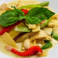 Green Curry · Spicy. Hot and light sweet authentic Thai Green Curry sauce with eggplant, bamboo shoots, pi...