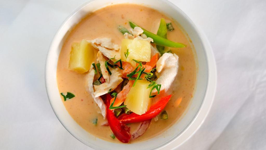 Panang Curry · Spicy. Smooth and creamy Thai Red Curry sauce with pineapple, kaffir lime leaves, string beans with a coconut milk. Served with jasmine rice. Spicy. Gluten free.