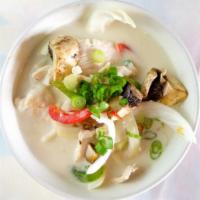 Tom Kha Soup · Thai aromatic and mild broth that's rich with coconut milk thai's herbs, galanga, kaffir lea...