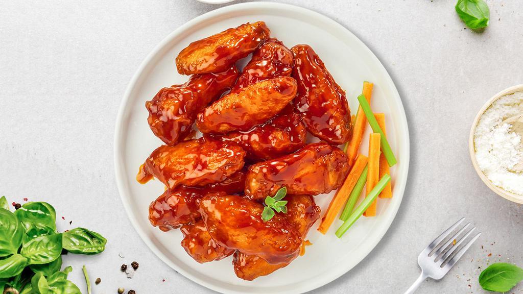 Buffalo Bliss Wings · (Ten pieces) Fresh chicken wings breaded, fried until golden brown, and tossed in buffalo sauce. Served with celery, carrots, and bleu cheese.