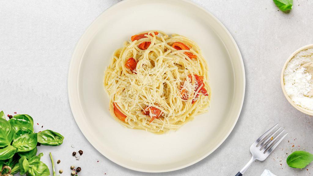 Carbonara On Command Pasta (Spaghetti) · Classic Italian pasta dish made with fresh spaghetti, chopped onions, bacon, butter, egg yolk, cream, and parmesan cheese.