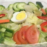 Garden Salad · Iceberg lettuce, tomatoes, cucumbers, broccoli, red and green bell pepper, carrots and hard ...