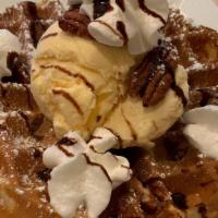 Vanilla Pecan Waffle · Belgian waffle baked with pecan and topped with vanilla ice cream.