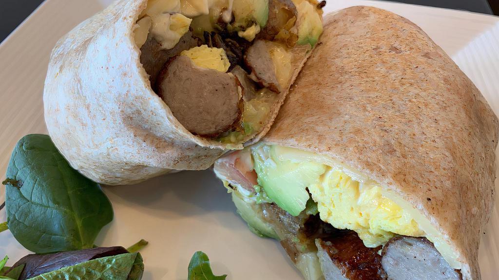 Breakfast Burrito · Avocado, tomatoes, pepper jack cheese, potatoes, scrambled eggs, and mayo on a whole-wheat wrap with a choice of bacon or sausage.