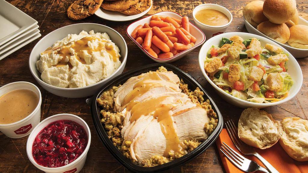 Three-Course Family Meals · Choose your favorite family size entrée, served with 2 family size sides, your choice of a family size garden salad or family size soup, a dozen freshly baked rolls and 4 chocolate chunk cookies. Serves up to 6.