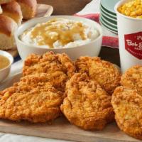 Hand-Breaded Fried Chicken Family Meal · Six hand-breaded all white meat chicken breasts served with 2 family size sides and a dozen ...