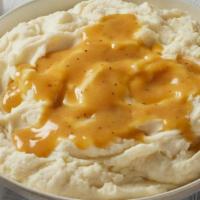 Family Size Mashed Potatoes & Gravy  · Our famous mashed potatoes served with your choice of homemade chicken, beef or country grav...