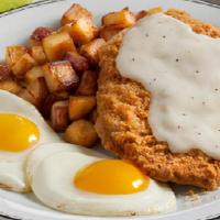 Country-Fried Steak & Farm-Fresh Eggs* · Lightly breaded tender premium beef smothered with country gravy and served with two fresh-c...