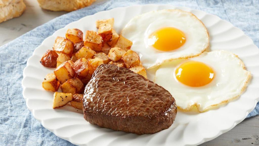 Sirloin Steak* & Farm-Fresh Eggs* · Marinated Choice sirloin* cooked-to-order and served with two fresh-cracked eggs* cooked-to-order with your choice of hash browns or home fries and freshly-baked biscuits