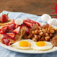 Fresh Berry Farmer'S Choice · Our best breakfast - topped with vine-ripened strawberries! Pick three buttermilk hotcakes o...