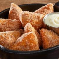 Cinna-Biscuits · Eight pieces of made-to-order fried biscuit dough dusted with cinnamon sugar and served with...