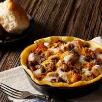 Sunshine Skillet · Open-faced omelet loaded with Bob Evans® sausage, country gravy, cheddar cheese and golden-b...