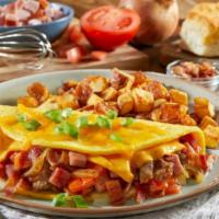 Three Meat & Cheese Omelet · Loaded with hickory-smoked ham, hardwood-smoked bacon, farm-famous sausage, real provolone c...
