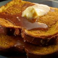 Brioche French Toast · Two slices of Brioche bread, hand-dipped in egg batter, vanilla and cinnamon then griddled. ...