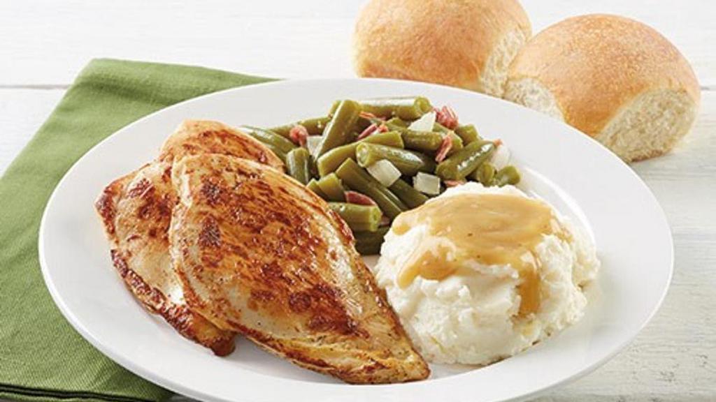 Grilled-To-Perfection Chicken · Two grilled chicken breasts served with choice of two sides and dinner rolls