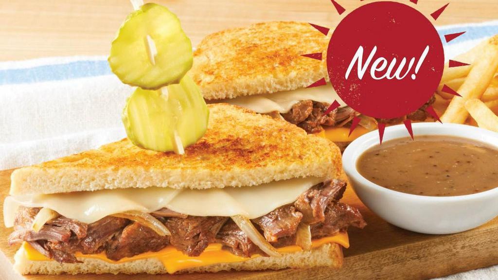 Double Cheese Pot Roast Dip · Our signature slow-roasted pot roast, caramelized onions, melted American cheese and real provolone cheese on grilled sourdough bread served with homestyle beef gravy for dipping.