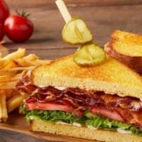 All American Blt · Four strips of center-cut hardwood-smoked bacon, lettuce, tomato and mayo on griddled brioch...