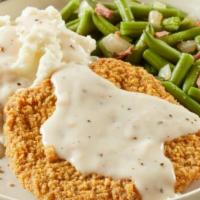 Country-Fried Steak · Smothered with country gravy and served with choice of two sides and dinner rolls