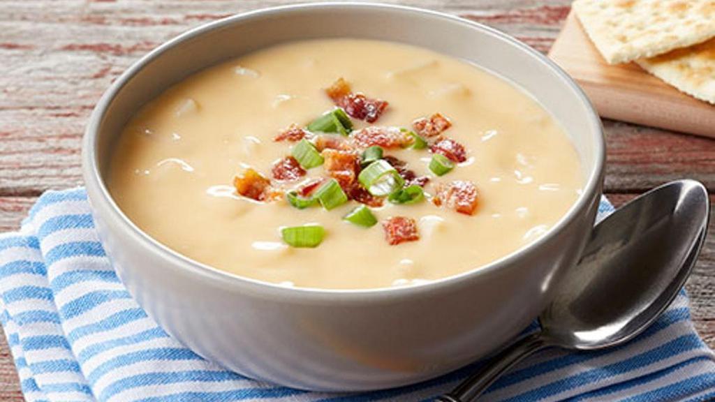 Cheddar Baked Potato Soup · Large cuts of potato blended together in a perfectly seasoned, satisfying, sharp cheddar cheese base. Topped with bacon.