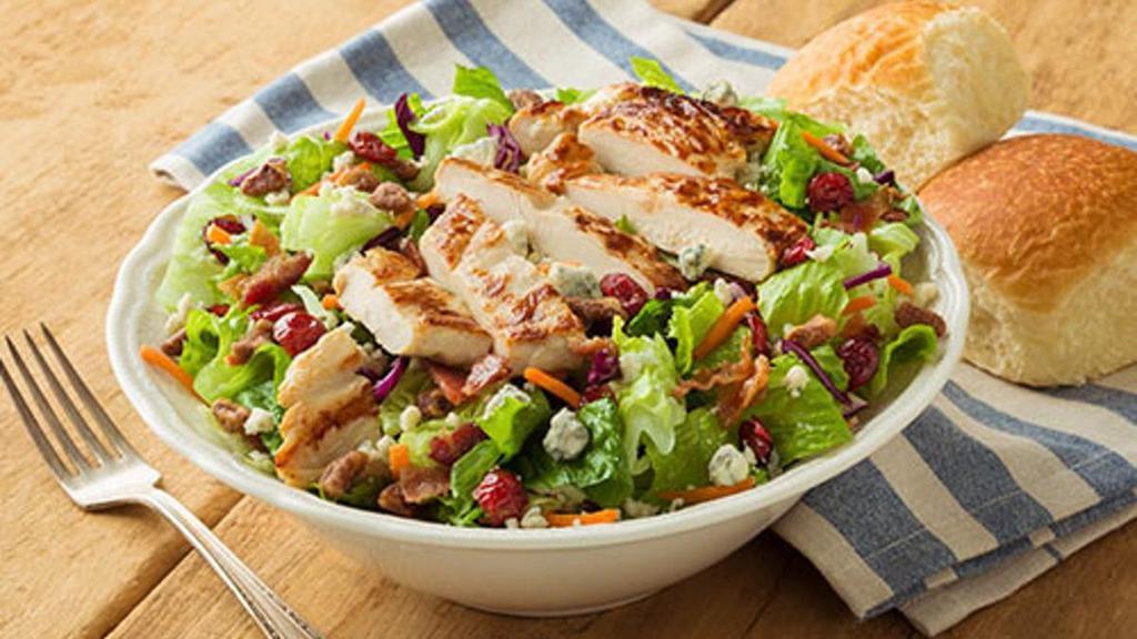 Cranberry Pecan Chicken Salad · Fresh greens with grilled chicken, bacon, dried cranberries, blue cheese and pecans. Pairs well with Colonial® dressing and served with dinner rolls