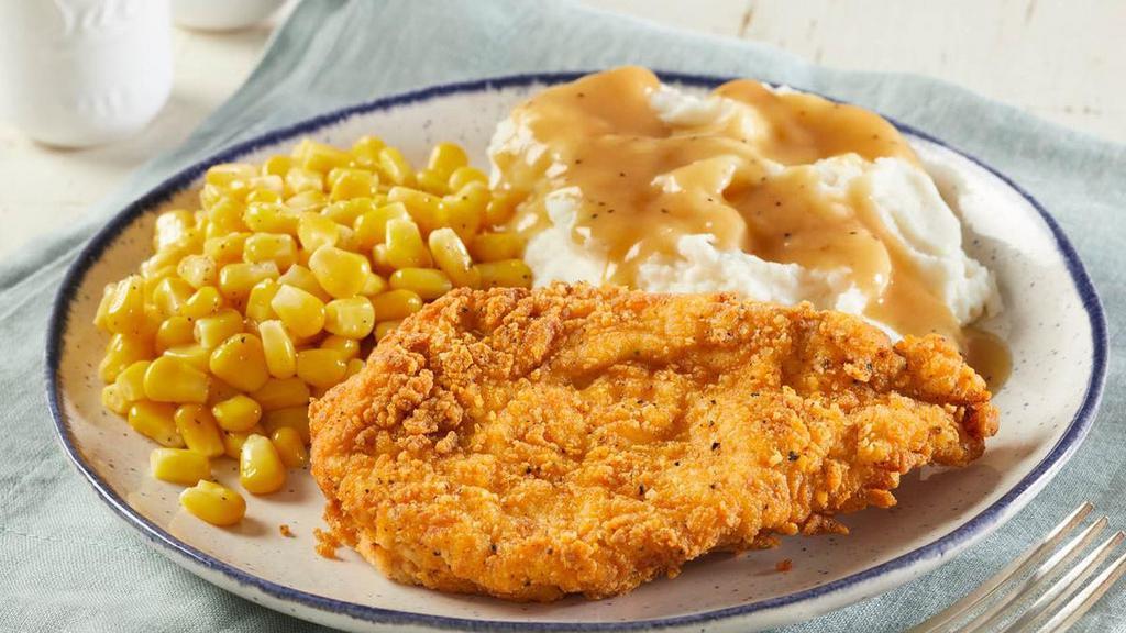 Hand-Breaded Fried Chicken · Served with mashed potatoes, gravy and corn.