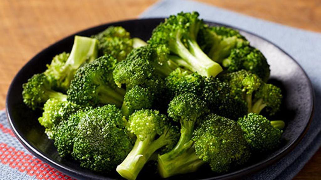 Steamed Broccoli · Fresh broccoli florets steamed and lightly buttered