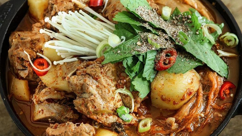 Gam Ja Jungol (L) / 감자전골 · Potato  & Pork's Backbone w/ Assorted Vegetable in Spicy Broth