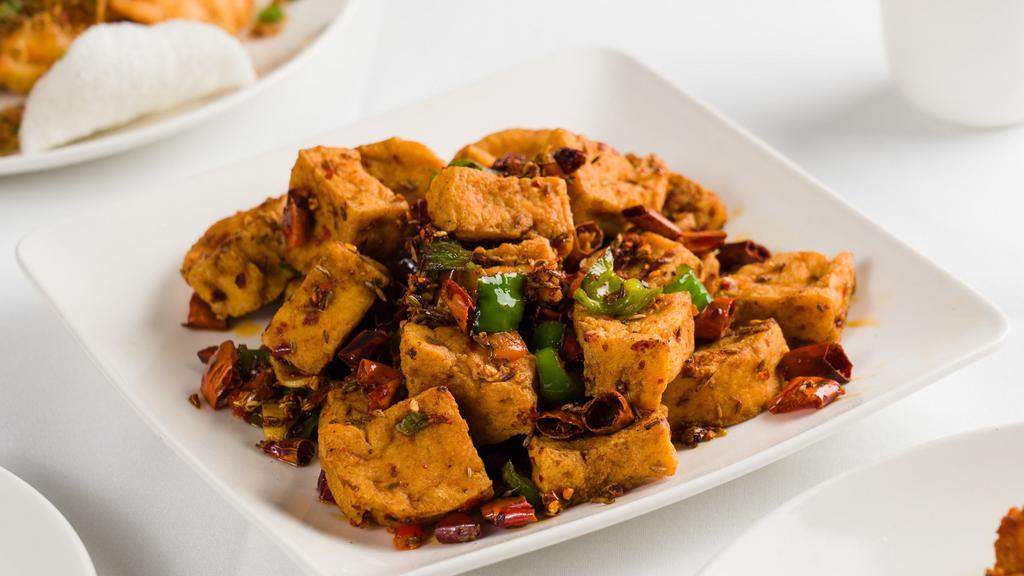 Stir Fried Crispy Tofu With Roasted Chili And Cumin · Very hot and spicy.