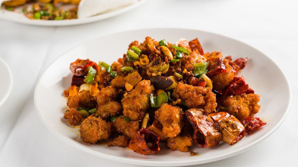 Smoky Wok Tossed Diced Chicken · Comes with thousand crispy chili and peanuts. Extra hot and spicy.