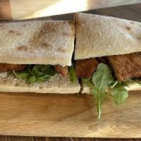 Veal Milanese Cutlet · Tomato, lettuce and onions.