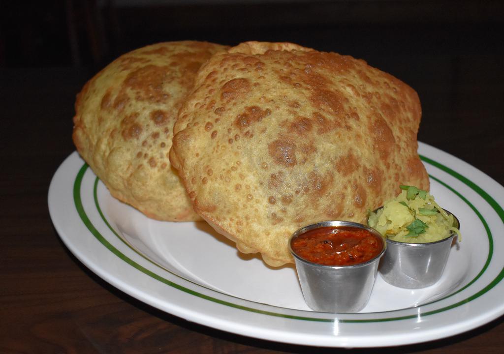 Poori Bhaji · Whole wheat bread deep fried and fluffy served with potato.