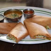 Spring Dosa · Spicy crepe filled with sauteed veg. Rolled and cut into pieces.