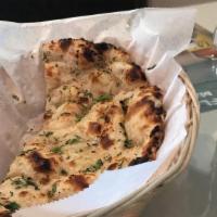 Garlic Or Chilli Naan · Sprinkled with garlic or chilli