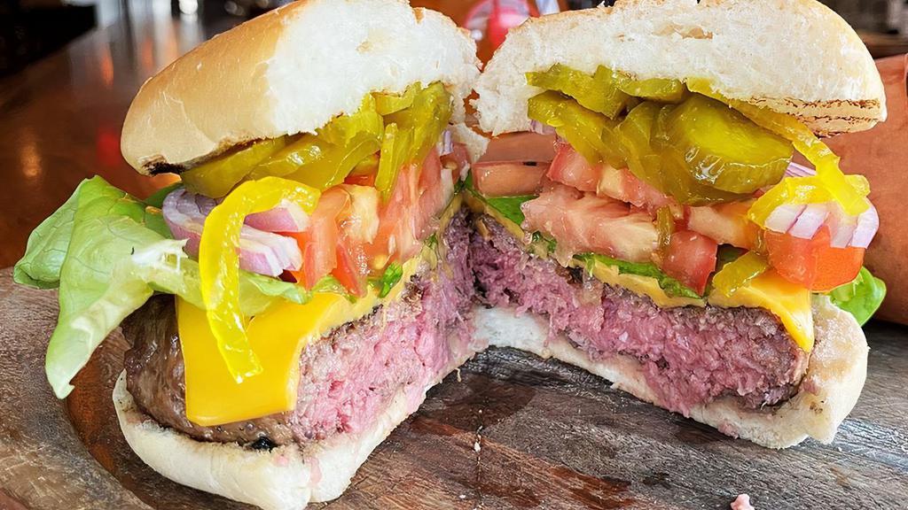 Dry Aged Burger · house-made pickles/soft bun/LTO