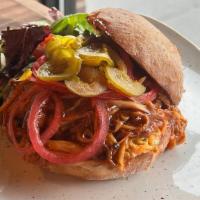 Bbq Pulled Mushroom · cabbage slaw/pulled mushrooms/bbq sauce/pickled onions/house-made pickles/village roll