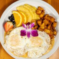 O.S. · Two Eggs over easy, served on a toasted english muffin dredged in a creole style sausage gra...