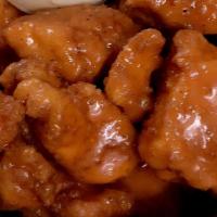 Boneless Wings · Hand breaded chicken breast bites tossed in your choice of sauce.