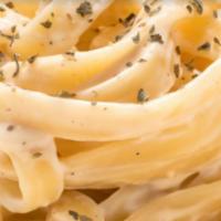 Fettuccine Alfredo · Served with soup or salad.
