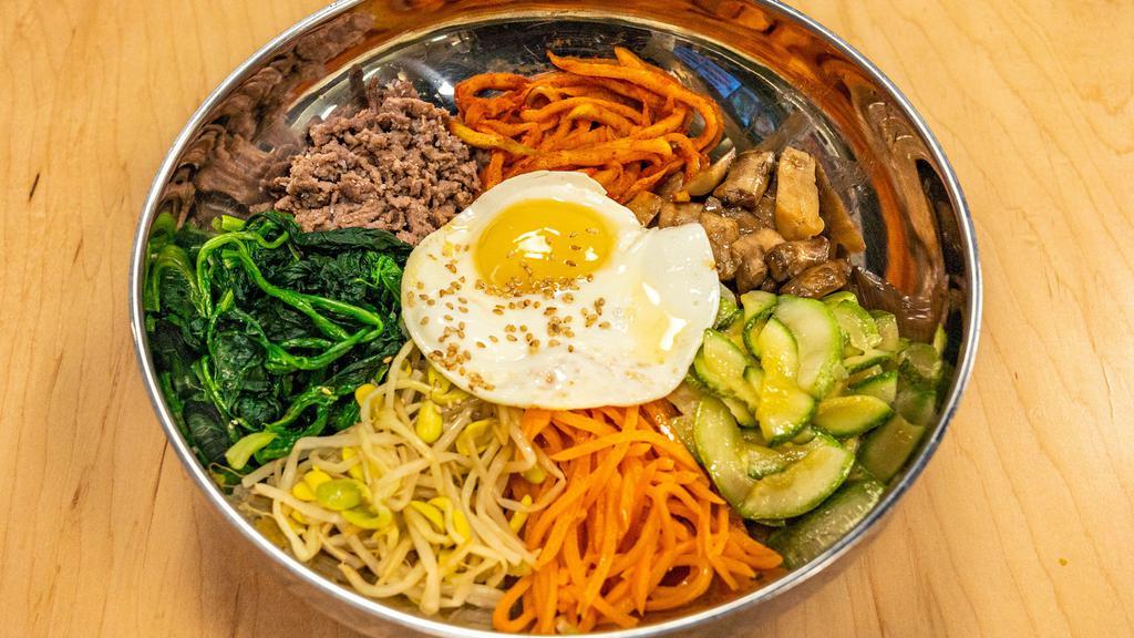 Bibimbap · Rice topped with meat or assorted vegetables and egg.
