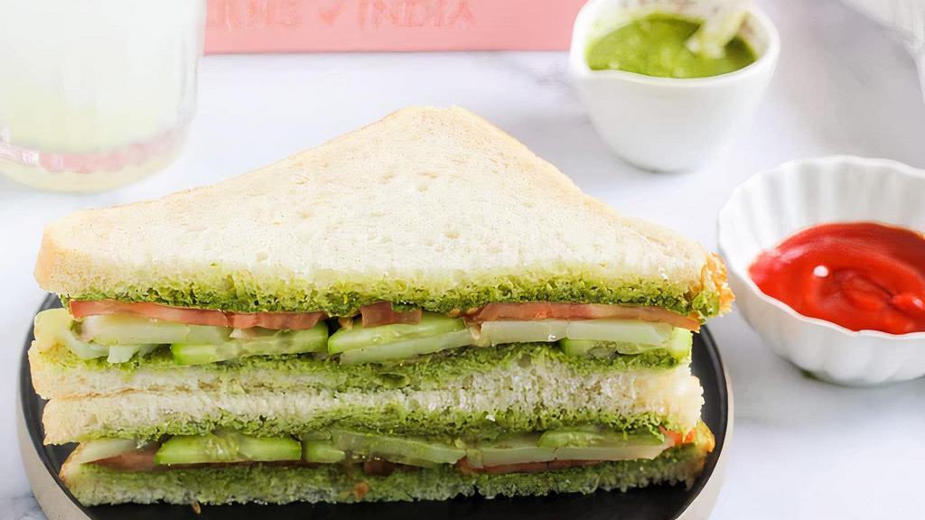 Karma Sandwich · White Bread, light butter, cilantro chutney sauce, potato, tomato, onion, cucumber & seasoning.