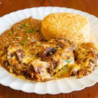 Chicken Mole Plato Grande  · Served with rice, cheese, refried beans and mole sauce.