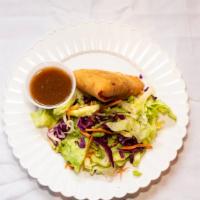 Vegetable Samosa · Fried pastry with potato and vegetable filling.