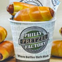 Mini Dogs Cup · Four bite-size, all beef mini pretzel dogs with American cheese.