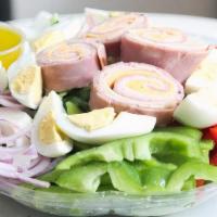 Traditional Chef'S Salad · Turkey,ham,swiss& American cheese, hard boiled eggs and cucumber over mixed greens.