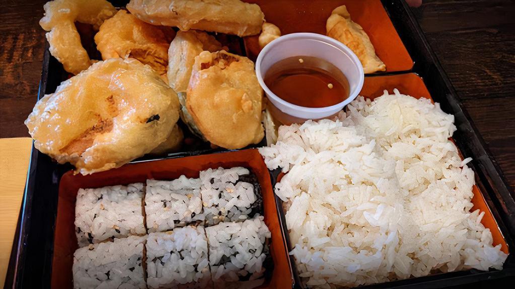 Dinner Shrimp Tempura Bento Box · 4 pieces jumbo shrimp tempura, 4 pieces veg tempura and California roll. Served with choice of side, dumpling and rice.