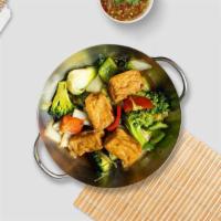 Sauteed Tofu Vegetables · Tofu, broccoli carrots, zucchini, lotus, asparagus, sugar-snap peas and cauliflower, sauteed...