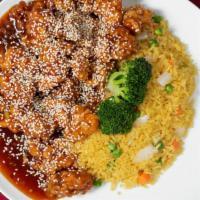 Sesame Chicken · Tender chicken stir-fried and sprinkle with roasted sesame seed. surrounded with broccoli in...