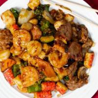Happy Family · Lobster, shrimp, scallop, roast pork, chicken, beef, crab meat with mixed vegetables in brow...